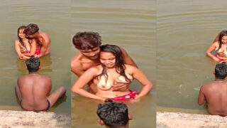 Village girl bathing topless in river with boyfriends